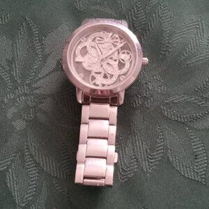 Ladies unique see through face Guess watch needs battery